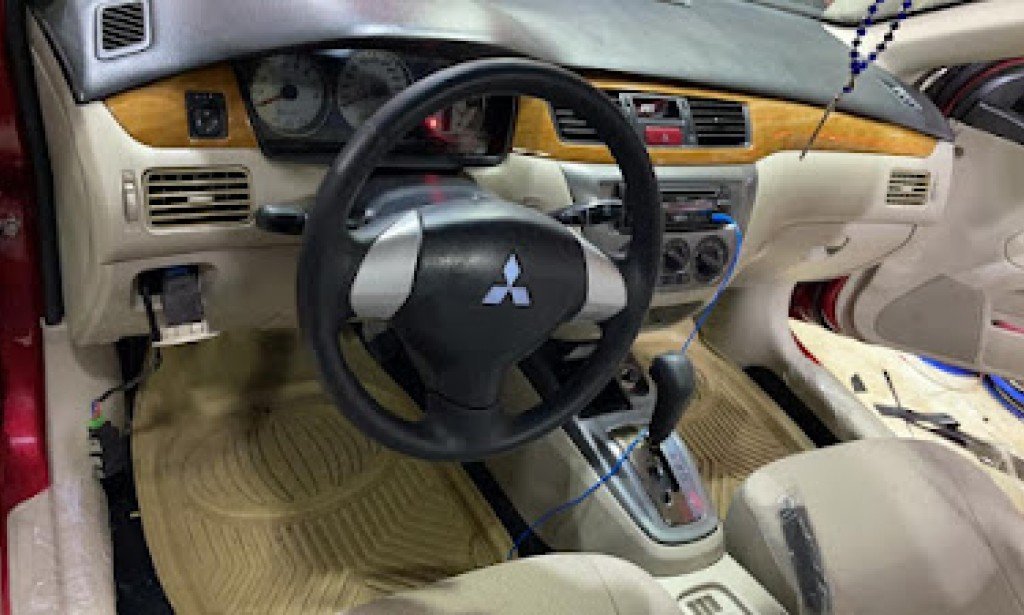 مواصفات و مميزات وعيوب سيارة لانسر بومة