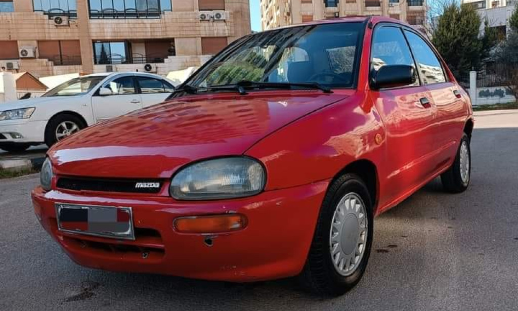 مواصفات و مميزات وعيوب سيارة مازدا 121